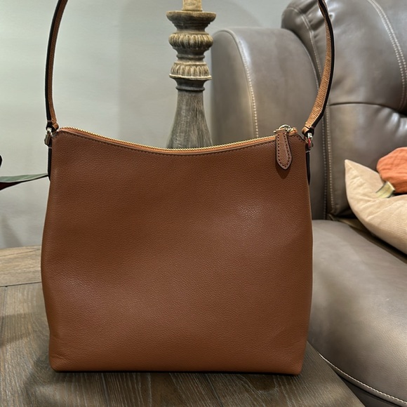 Kate Spade bucket purse with 2 front pockets. Tan leather. New W/O tags - Picture 7 of 14